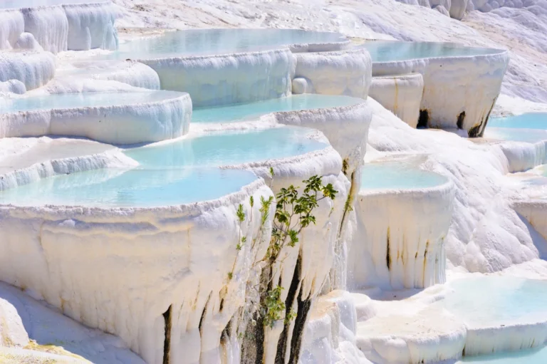 Cyan-colored travertine pools at ancient Hierapolis, Pamukkale
