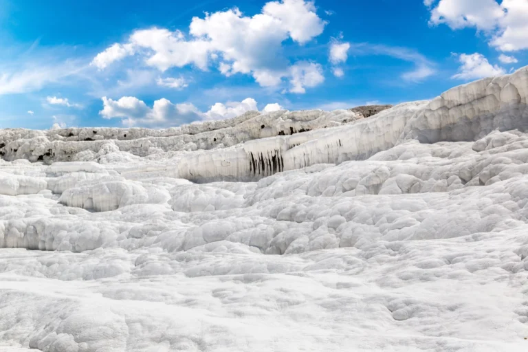 Turquoise water flowing over Pamukkale terraces
