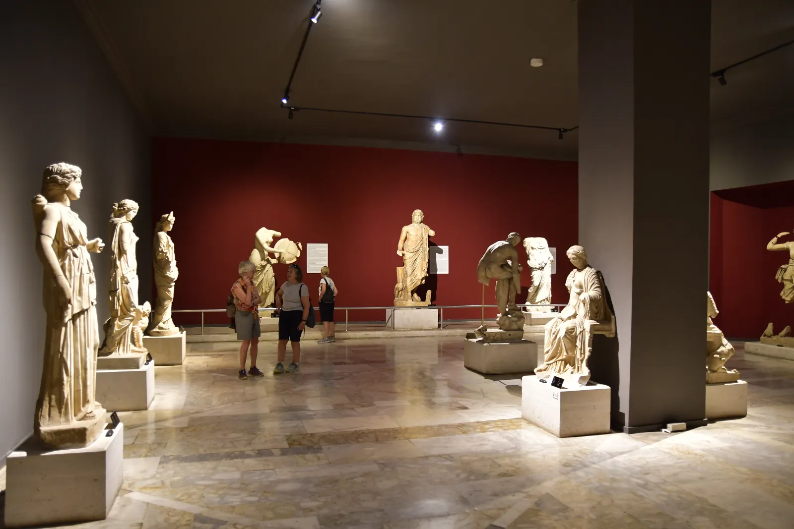 Roman marble statues displayed in the Hall of Gods at the Antalya Archaeological Museum