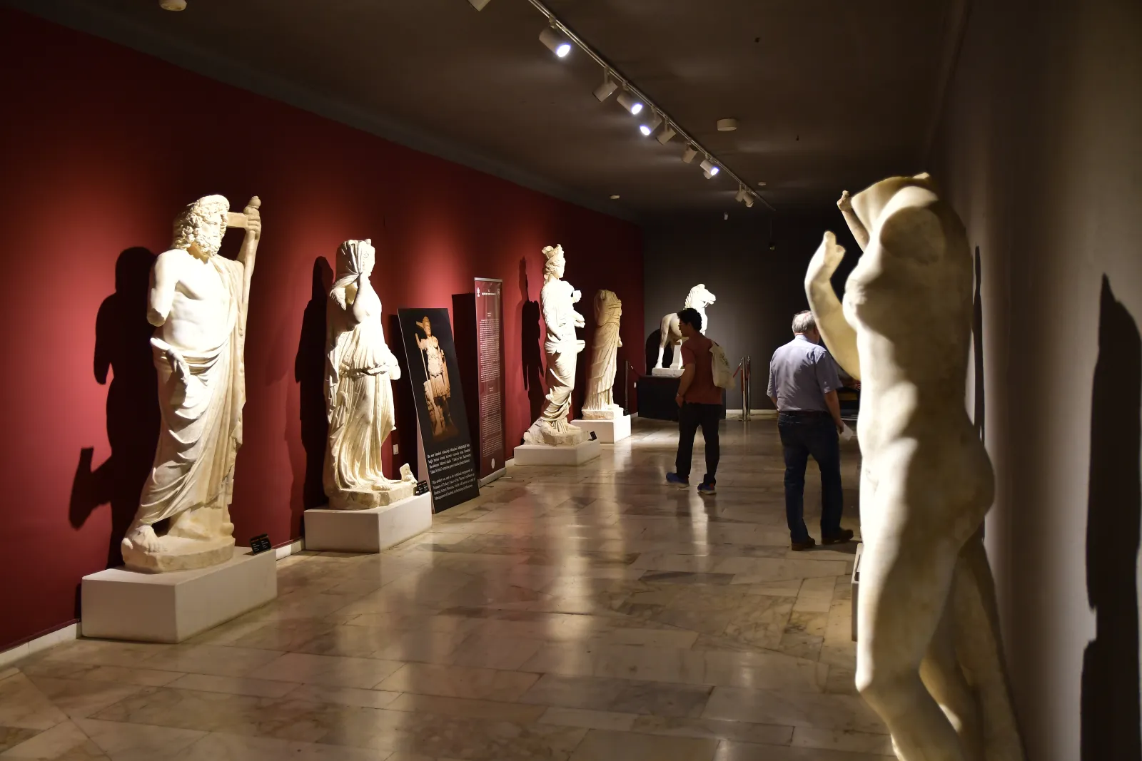Row of Roman marble statues from Perge along the gallery corridor in the Antalya Archaeological Museum