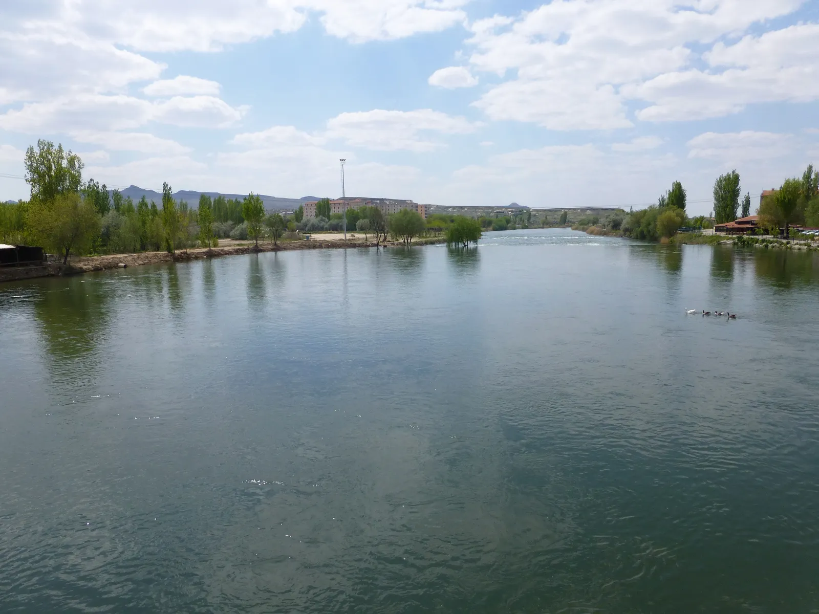 The Kızılırmak River flowing wide through Cappadocia near Avanos, the source of the red clay used by local potters