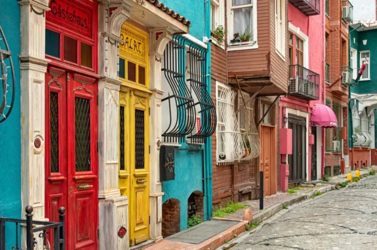 Colorful Ottoman-era houses lining a cobblestone street in Balat Istanbul