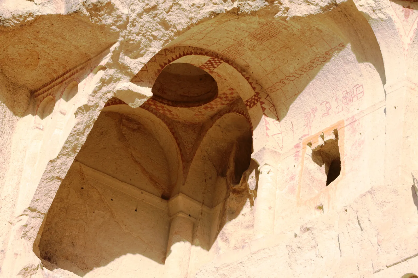 Byzantine frescoes in the Dark Church at Goreme showing scenes from the life of Christ in vivid blues and reds