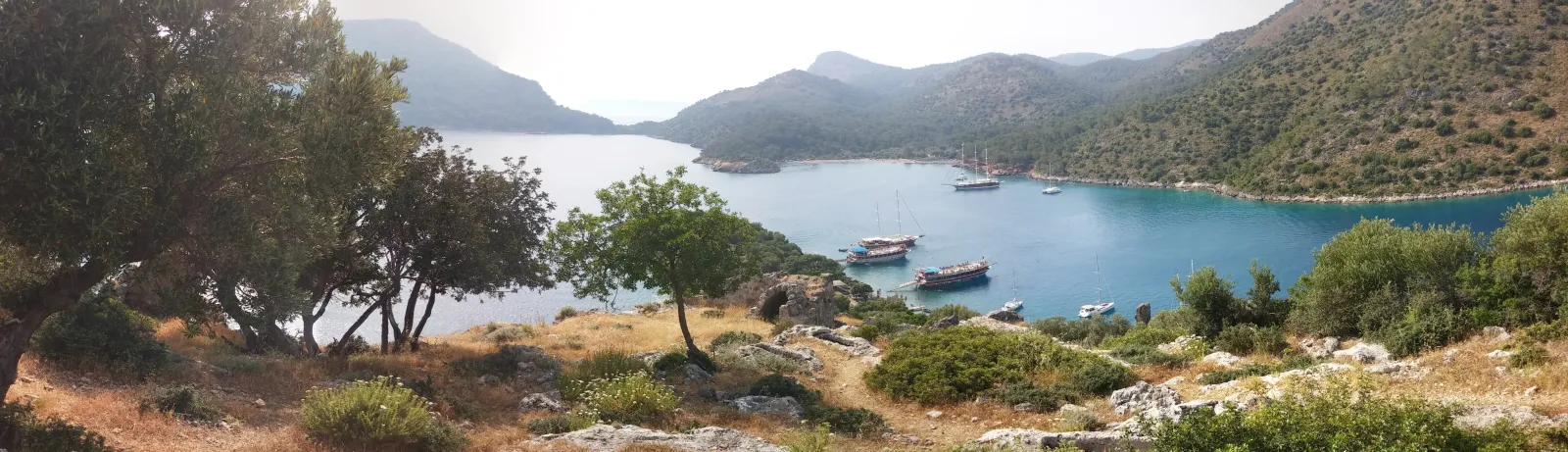 Panoramic view of Gemiler Island and the surrounding bay from the Fethiye coast