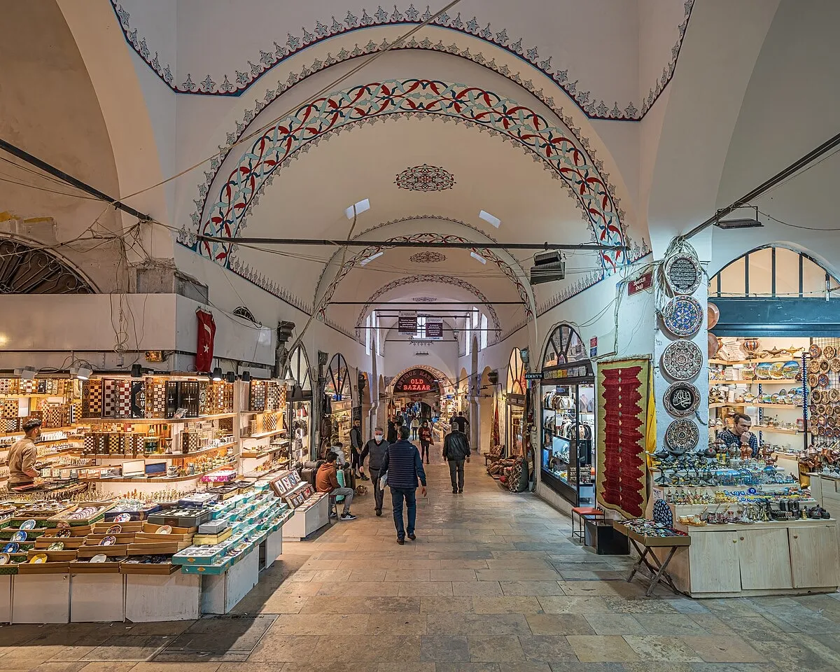 Interior corridor of the Grand Bazaar Istanbul with vaulted stone ceilings and rows of shops