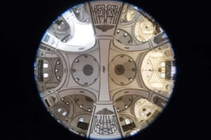 Interior of the Grand Mosque Bursa showing multiple domes and stone pillars