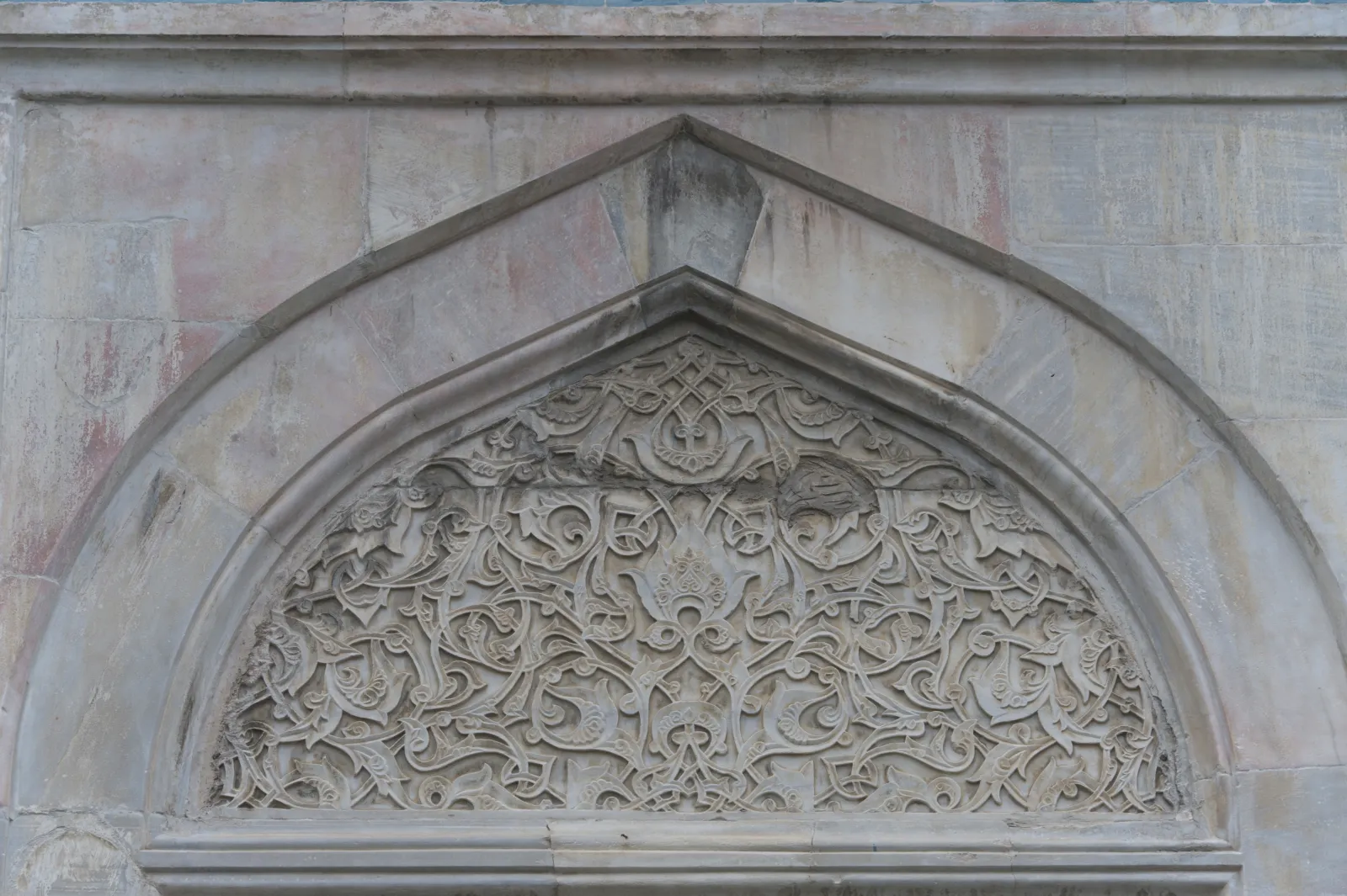 West side exterior of the Green Mosque Bursa with marble walls and window detail