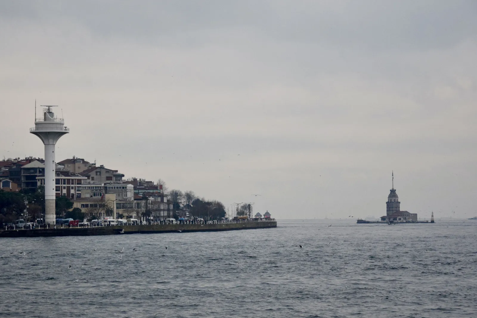 Close-up view of the restored Maiden's Tower (Kız Kulesi) rising from the Bosphorus waters in Istanbul