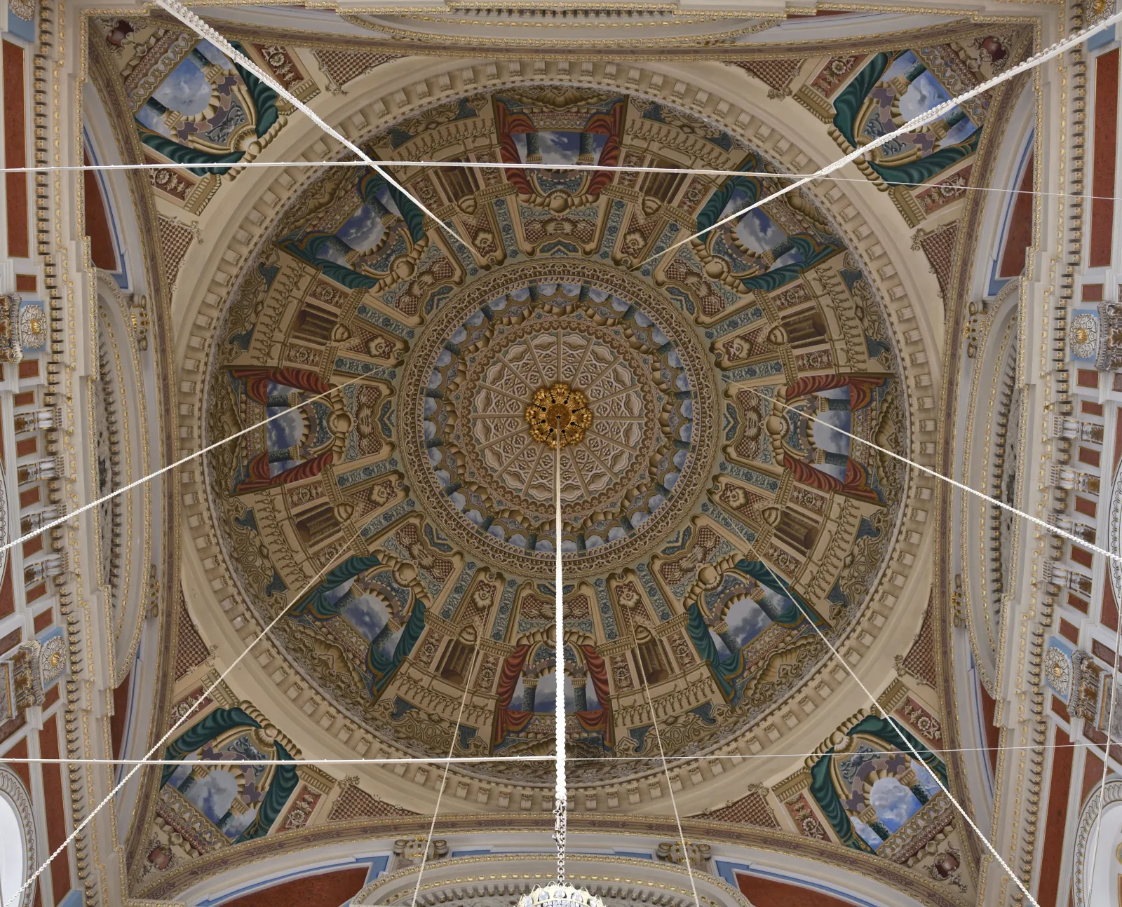 Interior of Ortakoy Mosque showing the decorated dome and large Bosphorus-facing windows