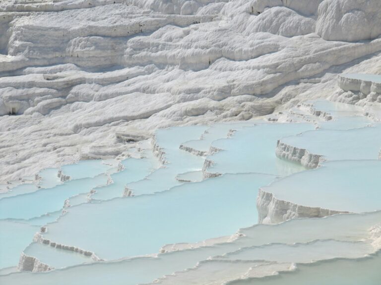Pamukkale white travertine terraces with thermal pools