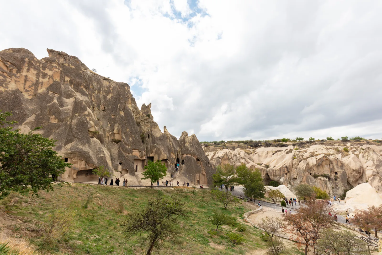 A multi-headed fairy chimney at Pasabag with carved monk cells visible in the upper section
