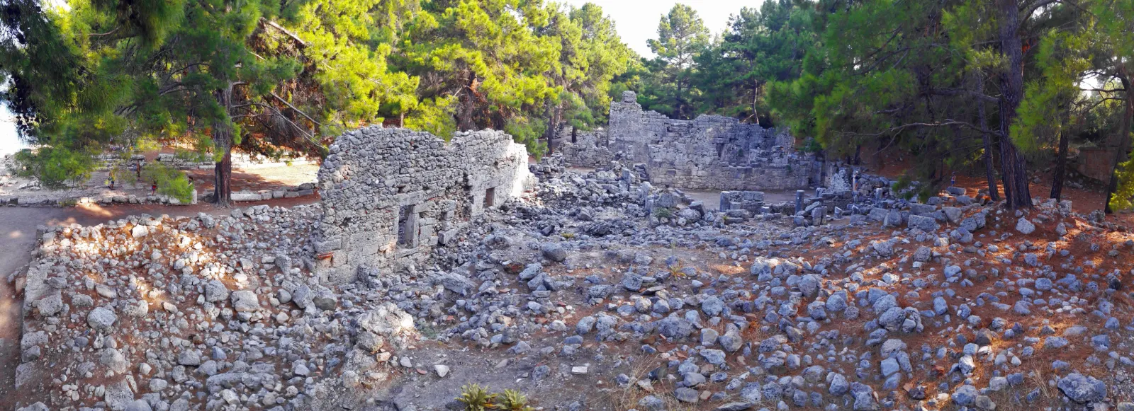 Panoramic view of Phaselis ancient city on the peninsula with harbors and pine forest