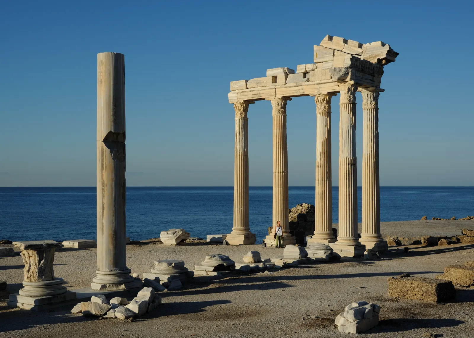 The Temple of Apollo at Side with marble columns and the Mediterranean horizon behind