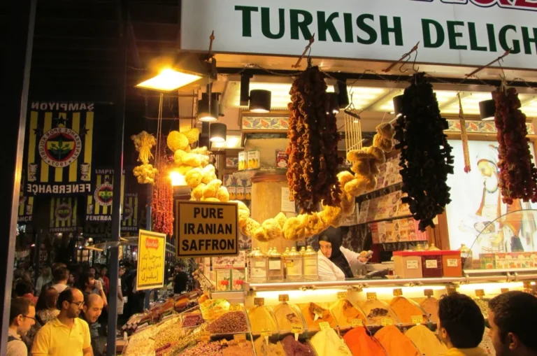 Interior of the Spice Bazaar Istanbul with colorful shop displays and vaulted corridor