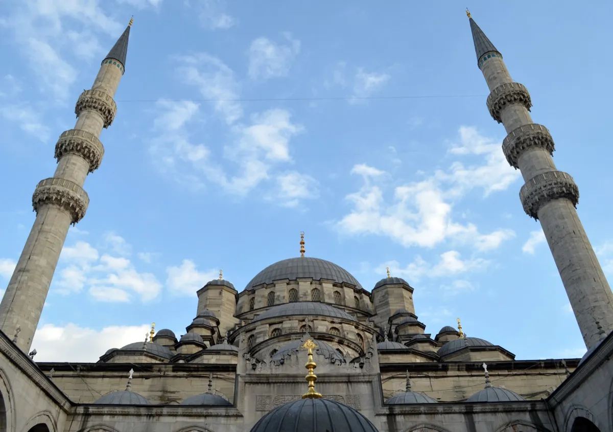 The New Mosque (Yeni Cami) in Eminonu Istanbul with its domes and minarets