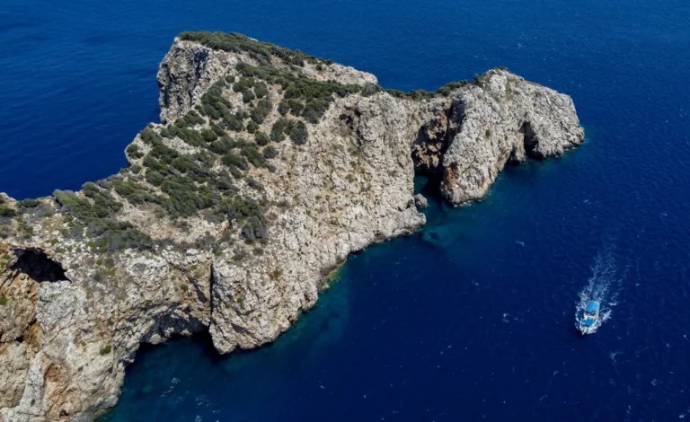 Aerial view of Suluada Island near Adrasan with turquoise water and boats anchored offshore