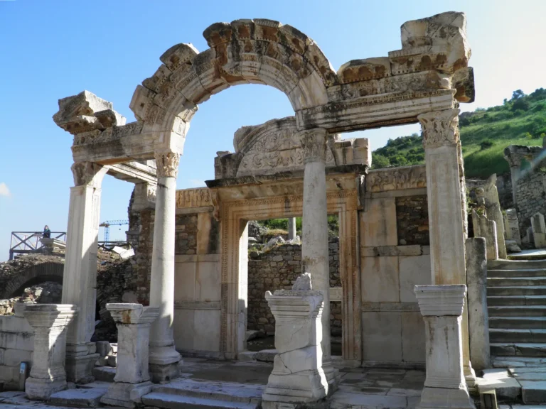 The facade of the Temple of Hadrian on Curetes Street in Ephesus with Corinthian columns and the Medusa relief arch
