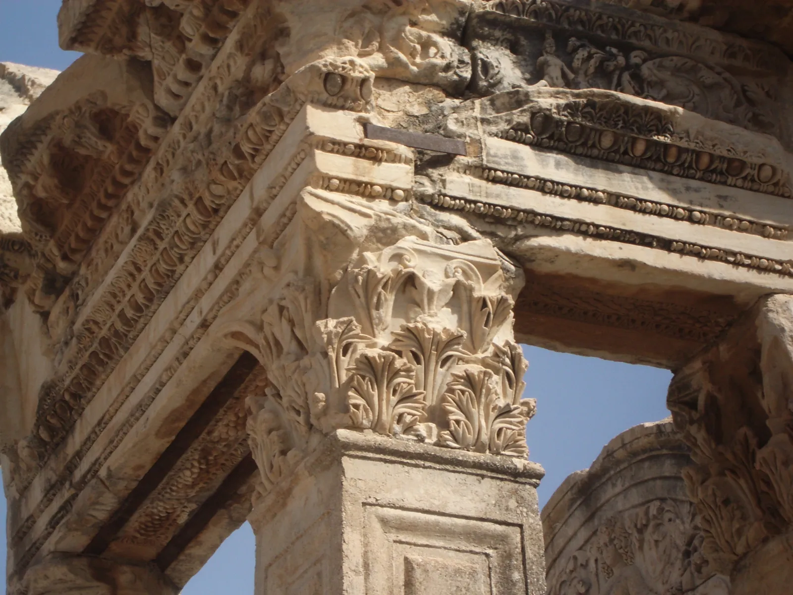 Detail of the Medusa relief carving above the doorway of the Temple of Hadrian in Ephesus