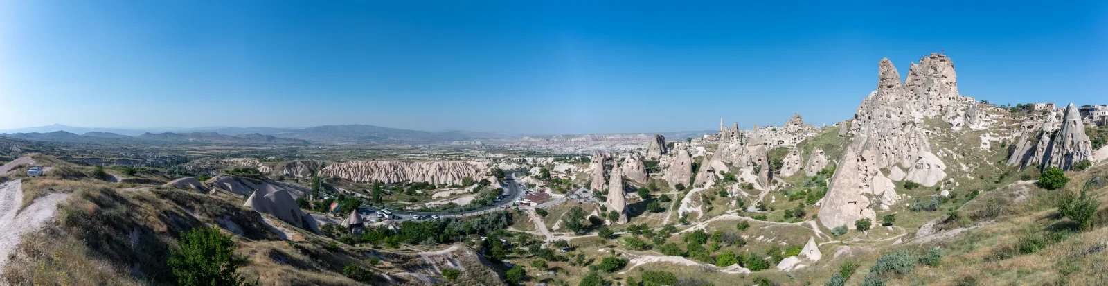 Panoramic view of Cappadocian valleys and fairy chimneys from the summit of Uchisar Castle