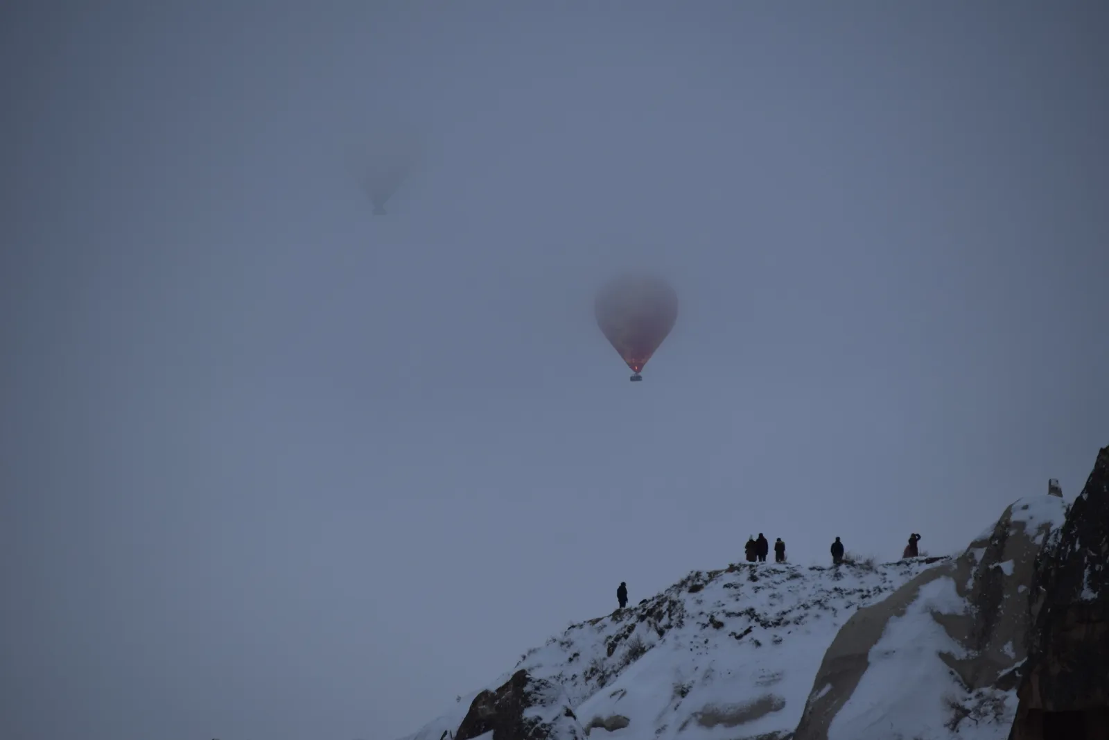 Cappadocia fairy chimneys covered in fresh snow during winter